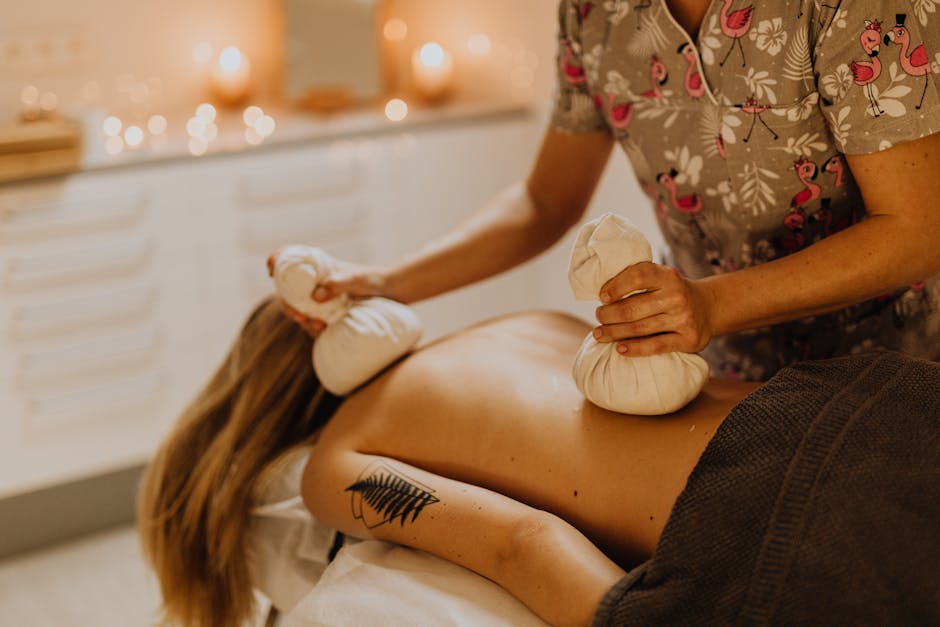 Enjoy a soothing spa experience with a relaxing massage using herbal compresses for ultimate relaxation.
